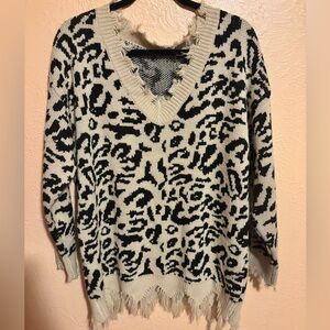 Stylish Black and Cream Leopard Print Sweater